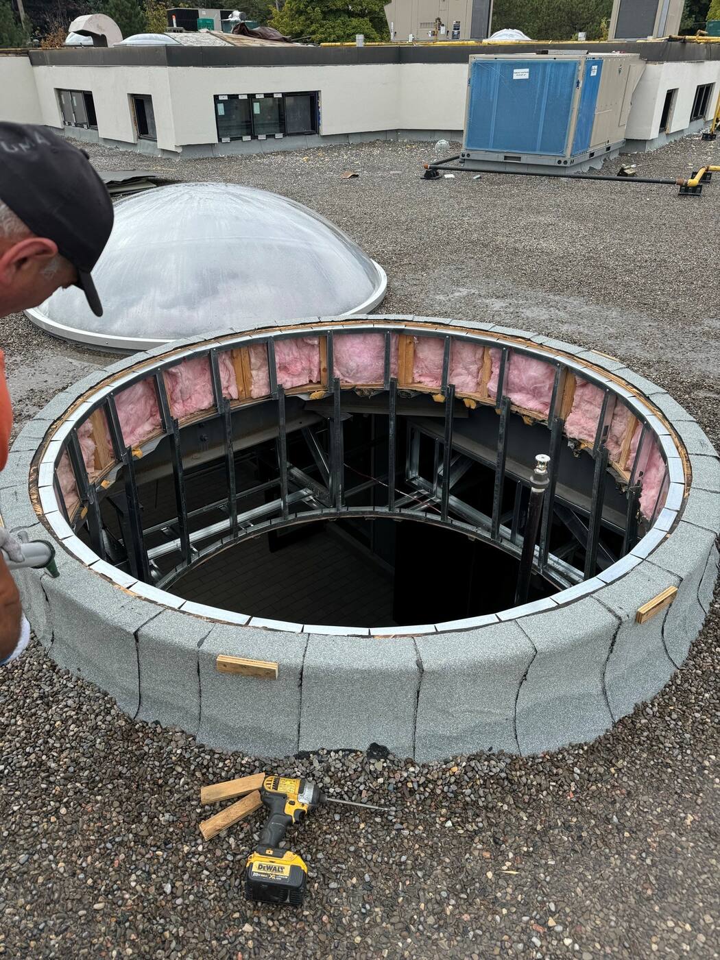 Curb construction on a low-slope roof, waterproofed before the unit lands &mdash; Well Roofing project