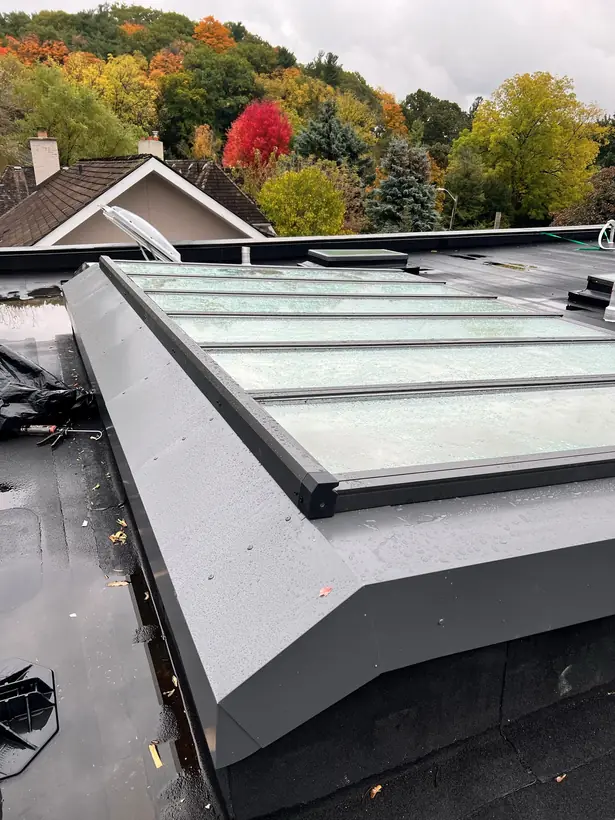 Longlight VELUX Modular Skylight installation by Well Roofing — Longlight on a residential flat roof