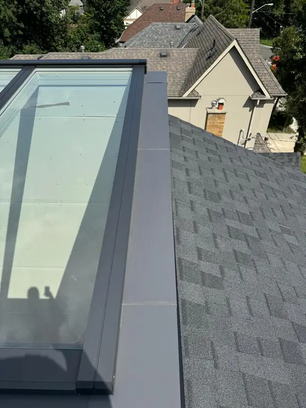 Longlight VELUX Modular Skylight installation by Well Roofing — Longlight on a shingled roof