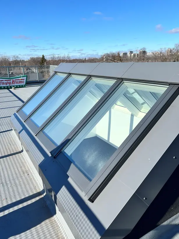 Ridgelight VELUX Modular Skylight installation by Well Roofing — Ridgelight over a flat roof, photograph 2