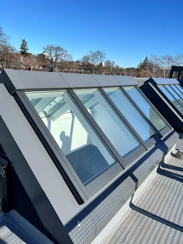 Ridgelight VELUX Modular Skylight installation by Well Roofing — Ridgelight over a flat roof, photograph 3
