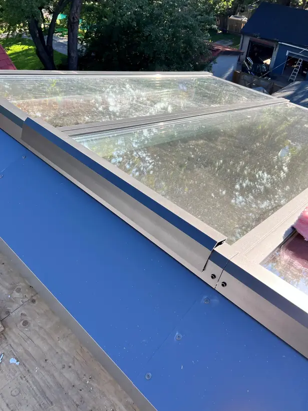 Longlight VELUX Modular Skylight installation by Well Roofing — Morse Street, photograph 7