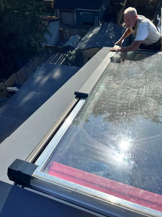 Longlight VELUX Modular Skylight installation by Well Roofing — Morse Street, photograph 8