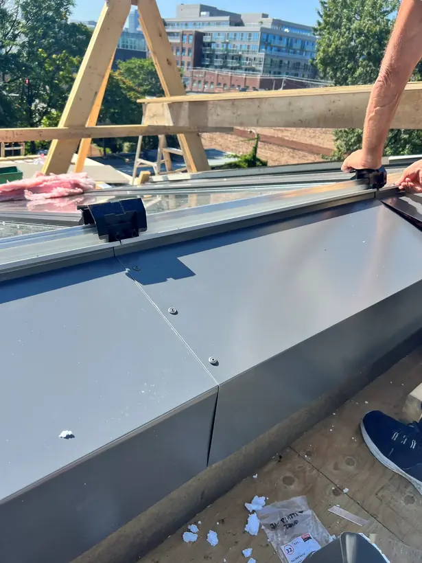 Longlight VELUX Modular Skylight installation by Well Roofing — Morse Street, photograph 10