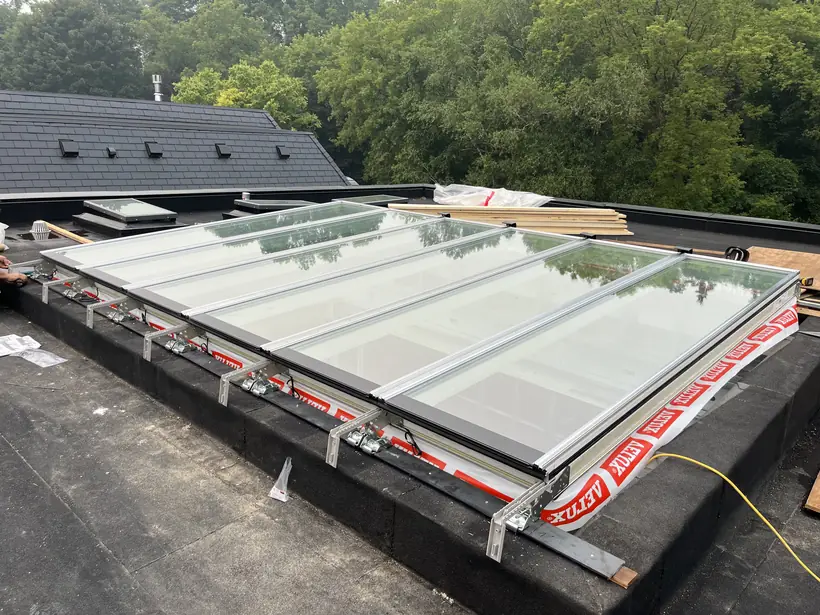 Longlight VELUX Modular Skylight installation by Well Roofing — Longlight on a residential flat roof, photograph 2