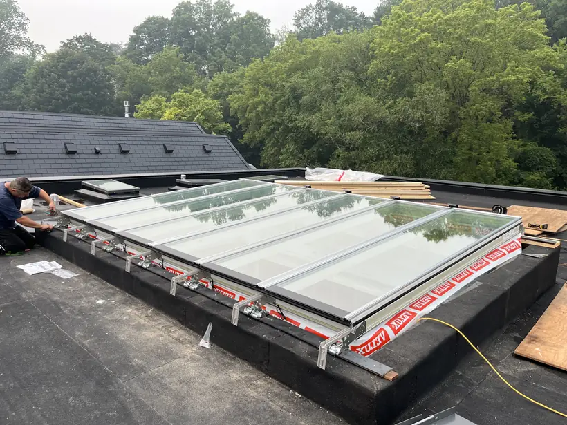 Longlight VELUX Modular Skylight installation by Well Roofing — Longlight on a residential flat roof, photograph 3
