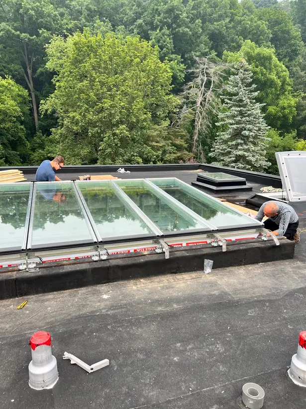 Longlight VELUX Modular Skylight installation by Well Roofing — Longlight on a residential flat roof, photograph 5