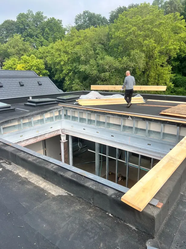 Longlight VELUX Modular Skylight installation by Well Roofing — Longlight on a residential flat roof, photograph 7
