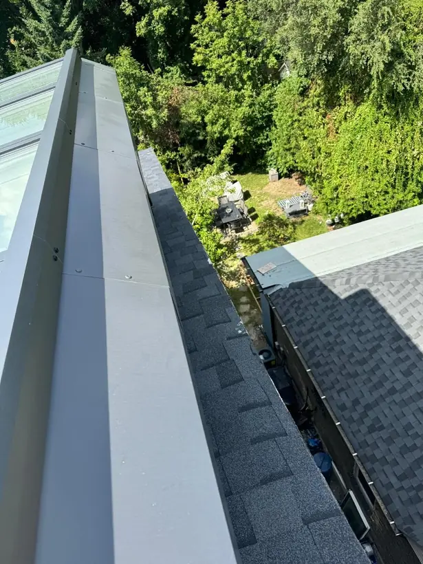 Longlight VELUX Modular Skylight installation by Well Roofing — Longlight on a shingled roof, photograph 3