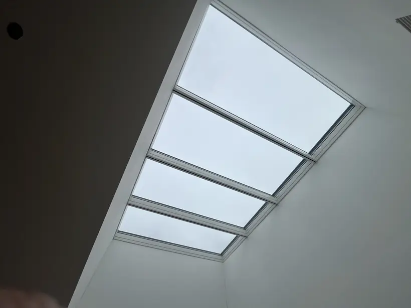 Longlight VELUX Modular Skylight installation by Well Roofing — Longlight on a shingled roof, photograph 6