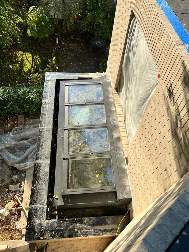 Wall-mounted Longlight VELUX Modular Skylight installation by Well Roofing — Wall-mounted Longlight, photograph 2