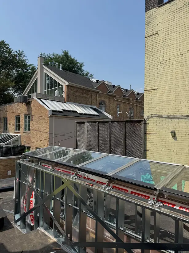 Longlight VELUX Modular Skylight installation by Well Roofing — Longlight on a rear addition, photograph 2