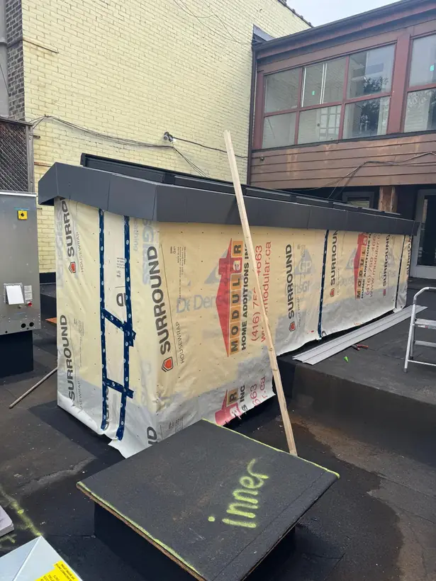 Longlight VELUX Modular Skylight installation by Well Roofing — Longlight on a rear addition, photograph 4