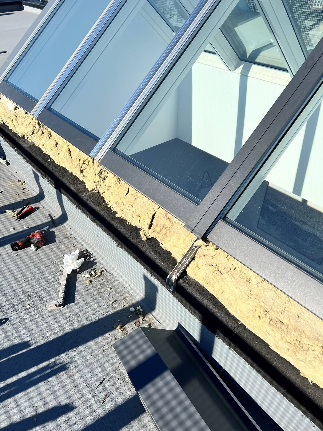 Modules being set and flashed on site &mdash; Well Roofing project